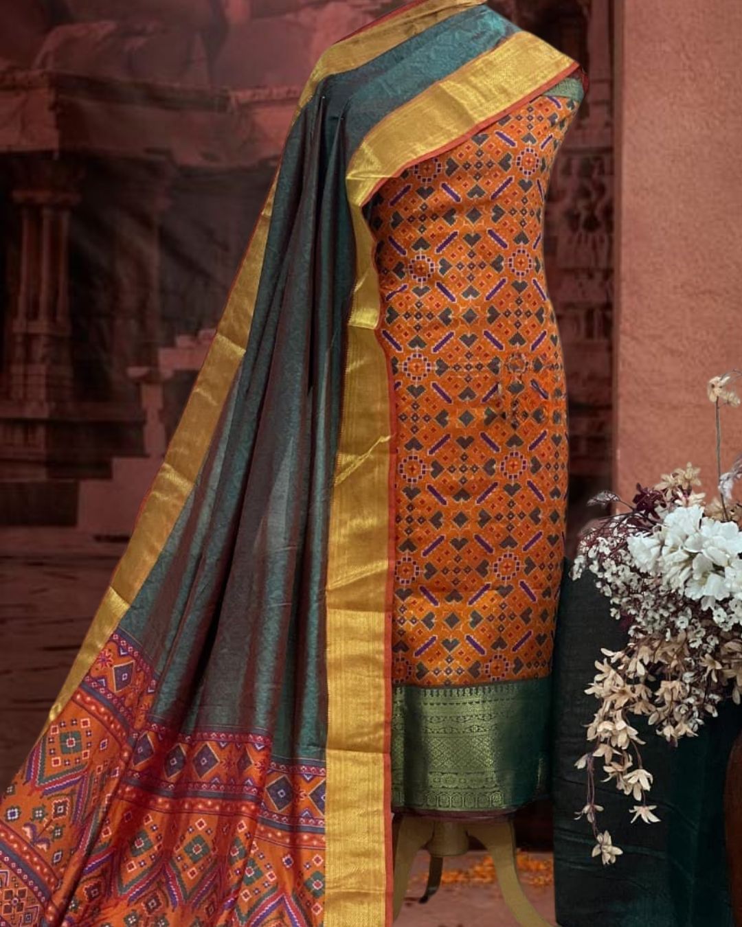 Festive Orange & Emerald Green Patola Silk Ensemble