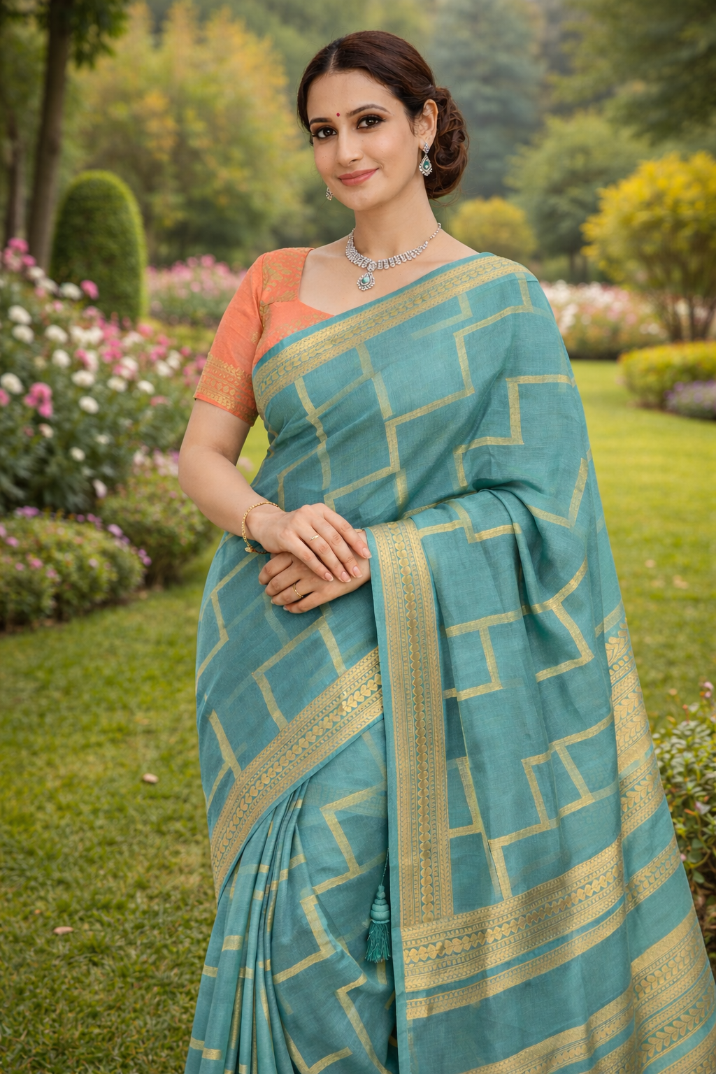 Sea Green Crepe Saree with Peach Designer Blouse